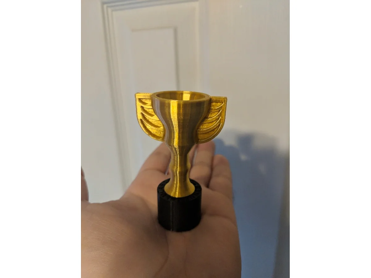 Trofeo de mano con base